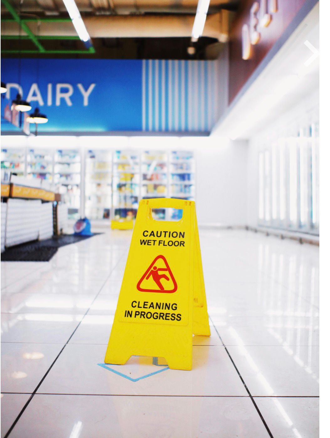 Commercial cleaning in progress at a retail space